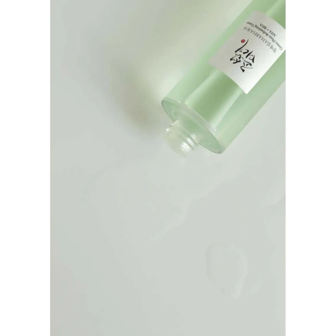 Green plum refreshing toner: aha + bha